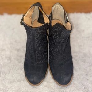 black heeled booties with cutout